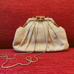 Vintage Judith Leiber lizard skin bag with tiger eye stone details.